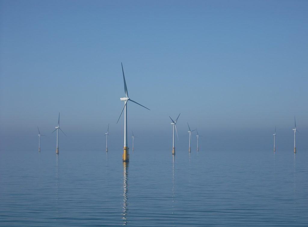 Offshore wind turbines standing in the sea