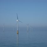 Offshore wind turbines standing in the sea